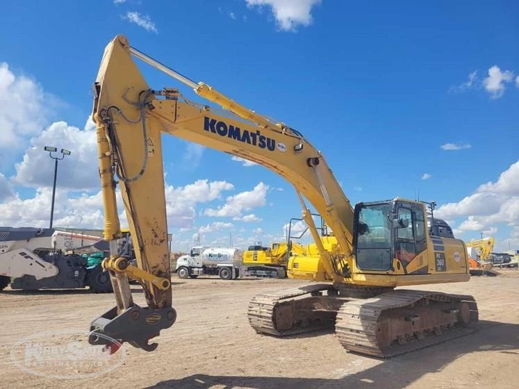 Used Komatsu Excavator under blue sky